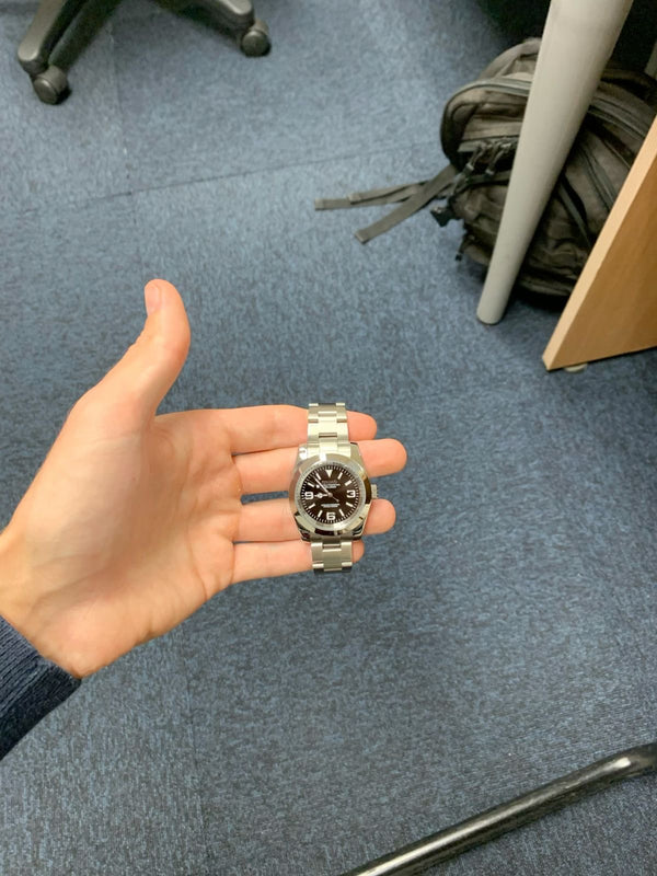 Customer holding an explorer style watch mod